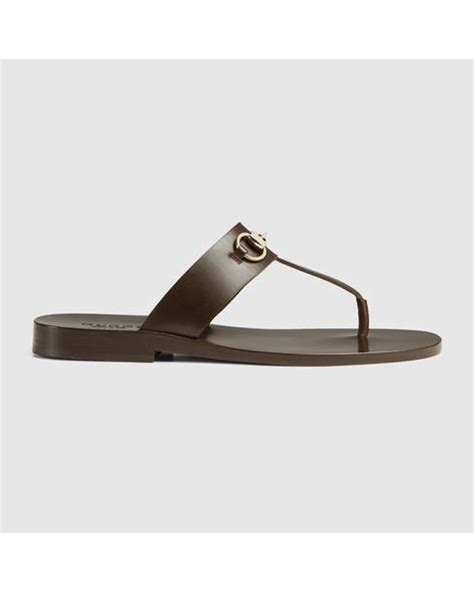 gucci leather horsebit thong sandal brown|Gucci slide sandals with horsebit.